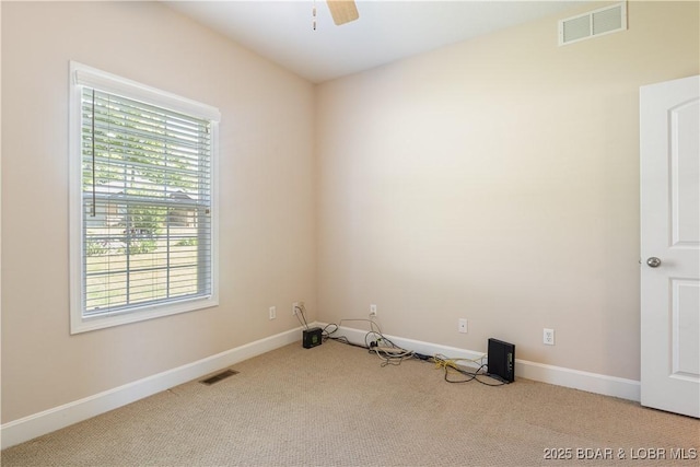 22714 Lake Ridge Dr, Warsaw, MO 65355 - spare room with carpet floors, baseboards, and ceiling fan