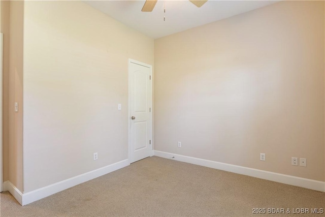 22714 Lake Ridge Dr, Warsaw, MO 65355 - empty room with light carpet, ceiling fan, and baseboards