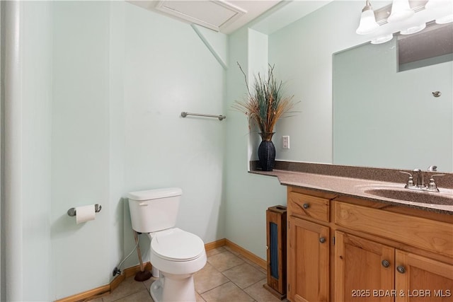 22714 Lake Ridge Dr, Warsaw, MO 65355 - bathroom with toilet, tile patterned flooring, vanity, and baseboards