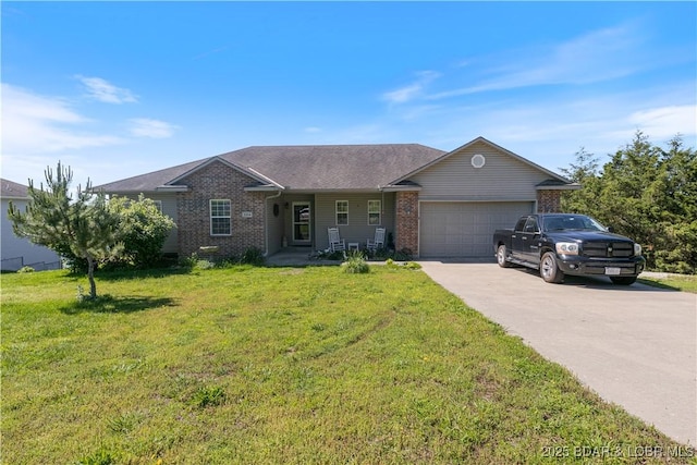 22714 Lake Ridge Dr, Warsaw, MO 65355 - single story home featuring brick siding, an attached garage, a front lawn, and concrete driveway