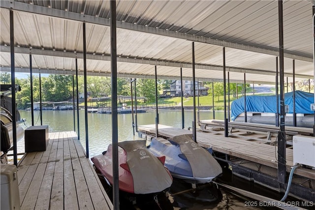 22714 Lake Ridge Dr, Warsaw, MO 65355 - dock with boat lift and a water view
