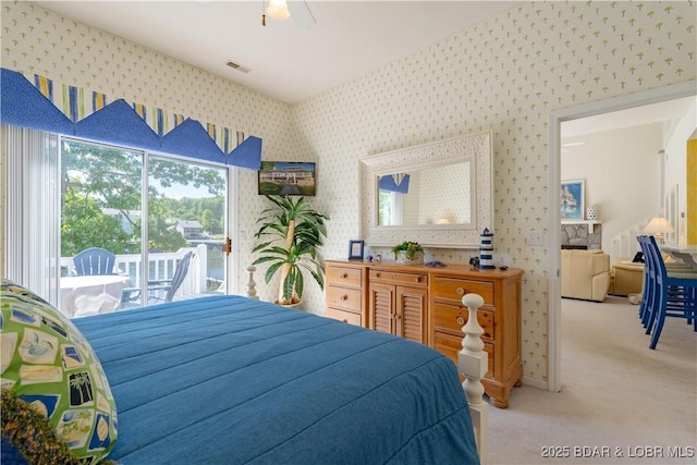 bedroom with wallpapered walls, access to exterior, light carpet, baseboards, and ceiling fan