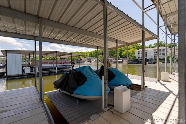 dock featuring a water view and boat lift
