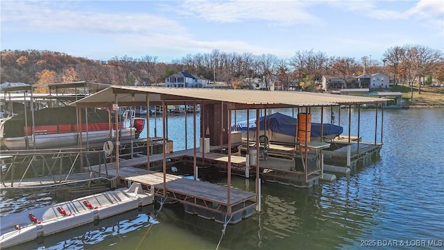 279 Spring Rd, Lake Ozark, MO 65049 - dock area featuring boat lift and a water view