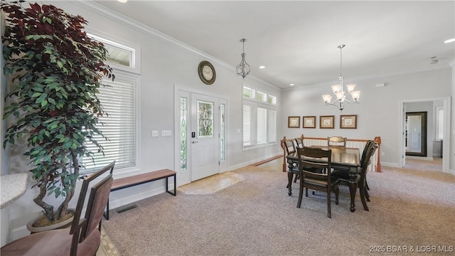 dining room featuring light carpet, ornamental molding, a chandelier, baseboards, and recessed lighting