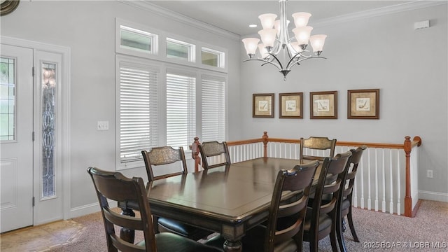 dining room with a chandelier, ornamental molding, baseboards, and recessed lighting