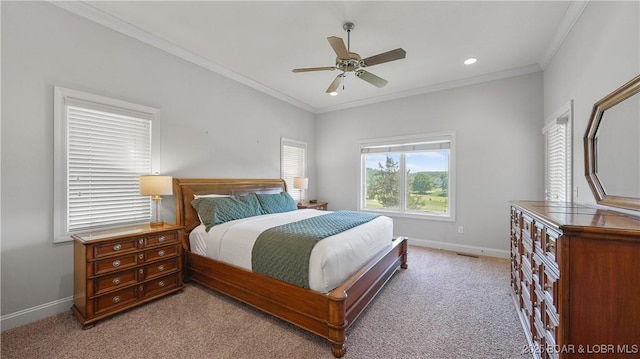bedroom with baseboards, light carpet, crown molding, a ceiling fan, and recessed lighting