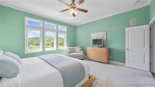 bedroom with crown molding, light carpet, baseboards, and a ceiling fan