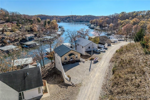 27085 Dixie Ln, Barnett, MO 65011 - drone / aerial view of a nearby body of water and a forest