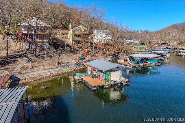 27085 Dixie Ln, Barnett, MO 65011 - dock area featuring a water view and boat lift