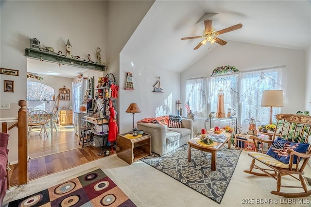 27085 Dixie Ln, Barnett, MO 65011 - living area with a ceiling fan, high vaulted ceiling, and wood finished floors