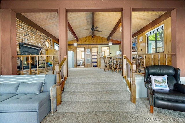 424 Bowers Dr, Camdenton, MO 65020 - stairs featuring carpet floors, wood ceiling, wooden walls, and a ceiling fan