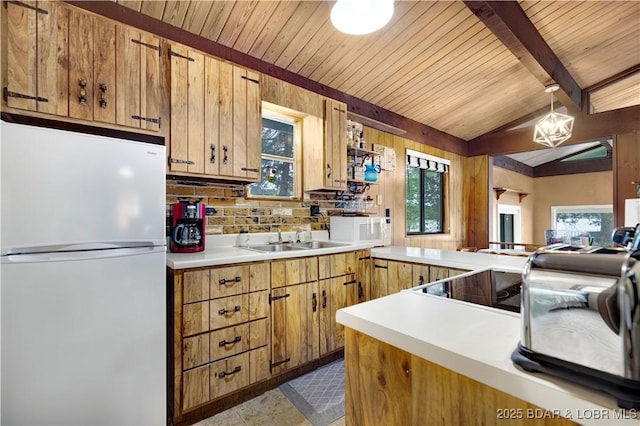 424 Bowers Dr, Camdenton, MO 65020 - kitchen featuring white appliances, light countertops, plenty of natural light, wooden ceiling, and tasteful backsplash
