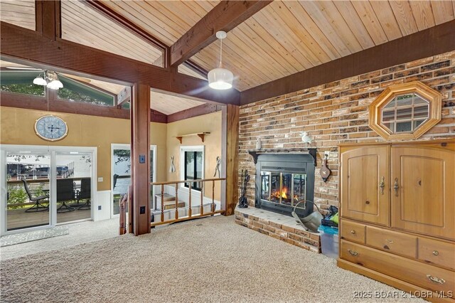 424 Bowers Dr, Camdenton, MO 65020 - unfurnished living room featuring carpet, a brick fireplace, and wooden ceiling