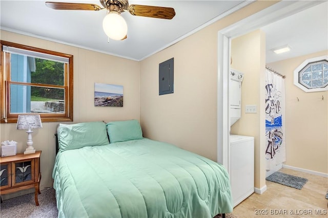 424 Bowers Dr, Camdenton, MO 65020 - bedroom with stacked washing machine and dryer, electric panel, ornamental molding, and a ceiling fan