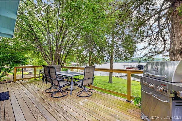 424 Bowers Dr, Camdenton, MO 65020 - deck with outdoor dining area and a yard