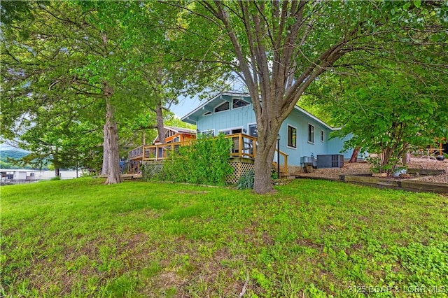 424 Bowers Dr, Camdenton, MO 65020 - view of grassy yard featuring a deck
