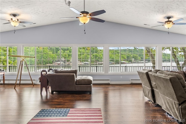 12 Mimosa Rd, Rocky Mount, MO 65072 - living room with lofted ceiling, ceiling fan, a baseboard heating unit, and a textured ceiling