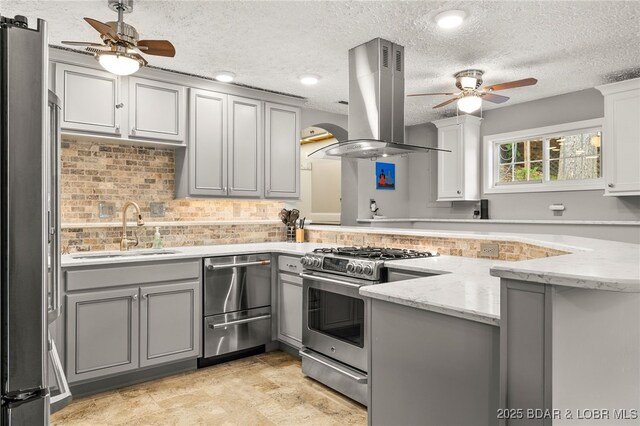 12 Mimosa Rd, Rocky Mount, MO 65072 - kitchen with island range hood, appliances with stainless steel finishes, gray cabinetry, a sink, and a textured ceiling
