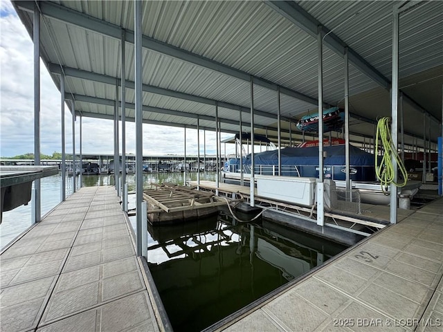 172 Cedar Glen Dr Unit 4B, Camdenton, MO 65020 - dock area featuring boat lift and a water view