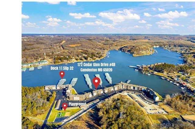 172 Cedar Glen Dr Unit 4B, Camdenton, MO 65020 - aerial view of a nearby body of water and a heavily wooded area