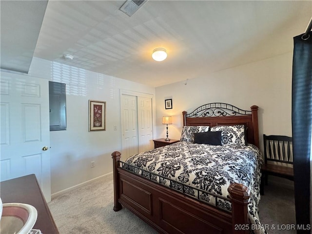 172 Cedar Glen Dr Unit 4B, Camdenton, MO 65020 - bedroom featuring carpet flooring, baseboards, electric panel, and a closet