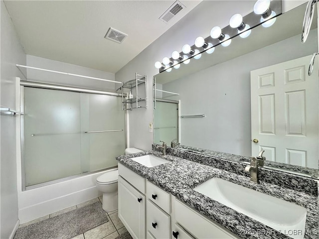 172 Cedar Glen Dr Unit 4B, Camdenton, MO 65020 - bathroom with toilet, combined bath / shower with glass door, double vanity, and tile patterned flooring