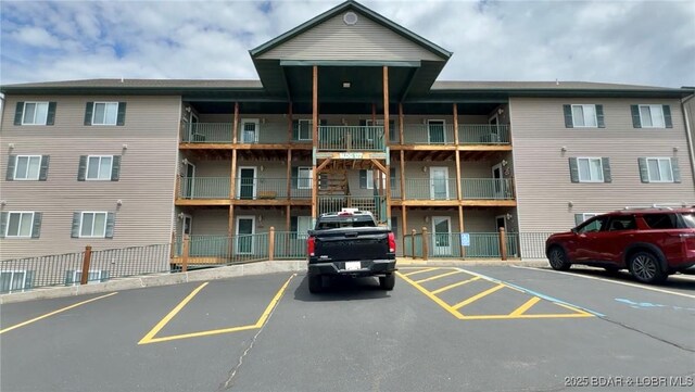 172 Cedar Glen Dr Unit 4B, Camdenton, MO 65020 - view of apartment building / complex featuring uncovered parking