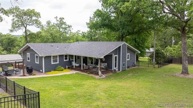 back of property with a wooden deck, roof with shingles, an outdoor hangout area, a patio, and view of scattered trees