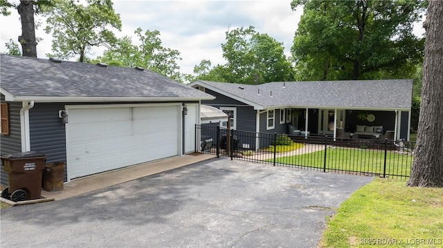 ranch-style house with a shingled roof