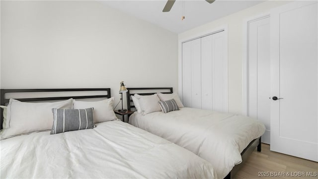 1045 Topsider Ln Unit 314, Osage Beach, MO 65065 - bedroom with wood finished floors, a closet, and a ceiling fan