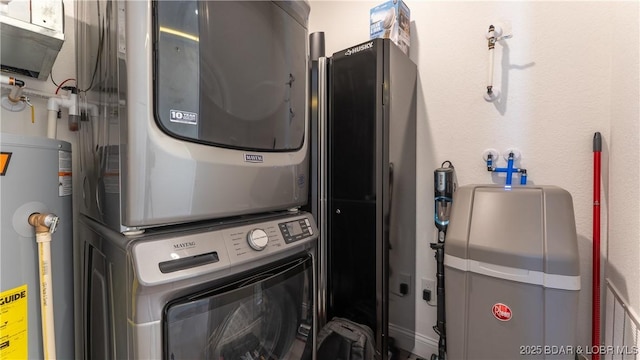 1045 Topsider Ln Unit 314, Osage Beach, MO 65065 - laundry room with stacked washer and clothes dryer and gas water heater