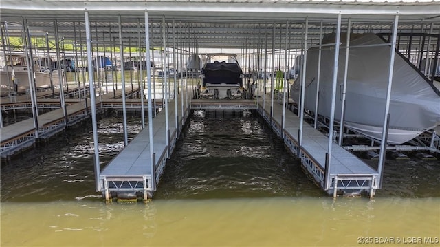 1045 Topsider Ln Unit 314, Osage Beach, MO 65065 - dock area featuring boat lift and a water view