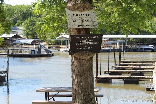 dock area featuring a water view