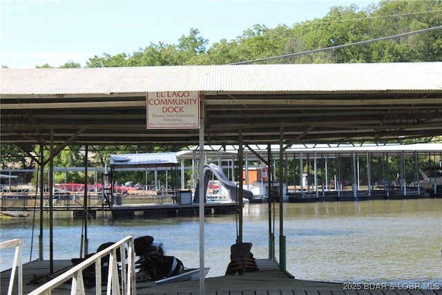 dock with a water view and boat lift