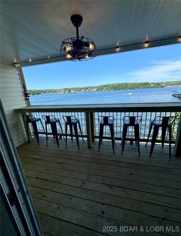 1481 Ledges Dr Unit 1019, Osage Beach, MO 65065 - wooden deck featuring a water view