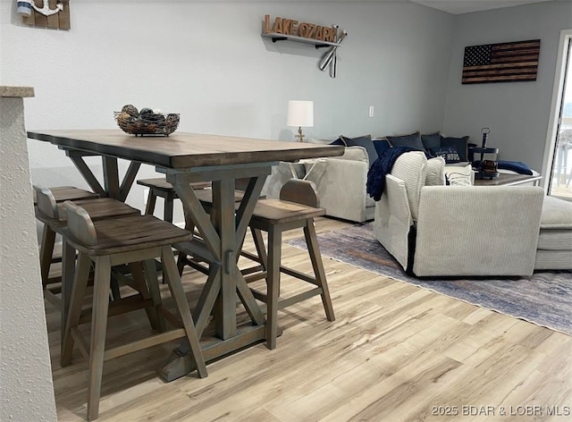 1481 Ledges Dr Unit 1019, Osage Beach, MO 65065 - dining area featuring light wood-type flooring