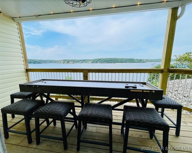 1481 Ledges Dr Unit 1019, Osage Beach, MO 65065 - balcony with a deck with water view and outdoor dining space