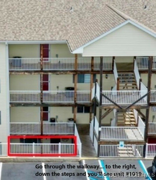 1481 Ledges Dr Unit 1019, Osage Beach, MO 65065 - view of building exterior featuring stairs