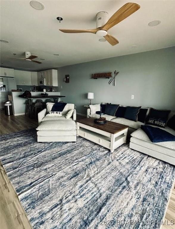 1481 Ledges Dr Unit 1019, Osage Beach, MO 65065 - living area featuring a ceiling fan and wood finished floors