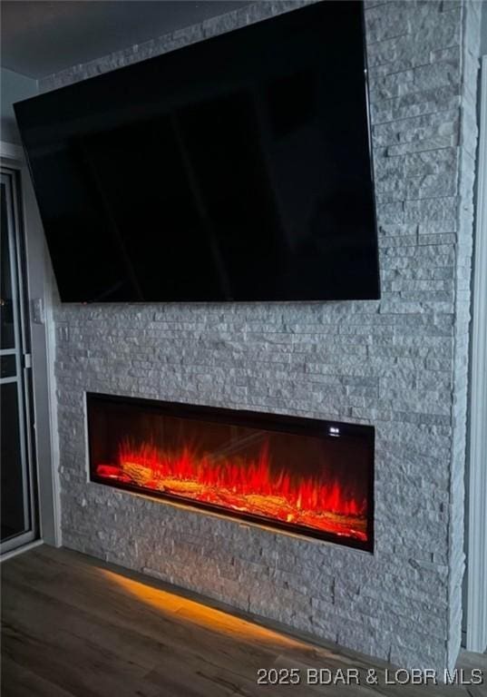 1481 Ledges Dr Unit 1019, Osage Beach, MO 65065 - detailed view of a lit fireplace