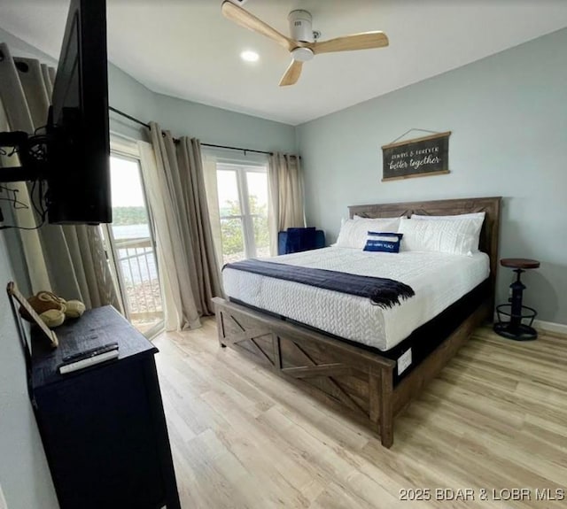 1481 Ledges Dr Unit 1019, Osage Beach, MO 65065 - bedroom featuring access to outside, light wood finished floors, a ceiling fan, and baseboards