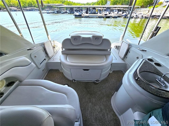 dock area with a water view