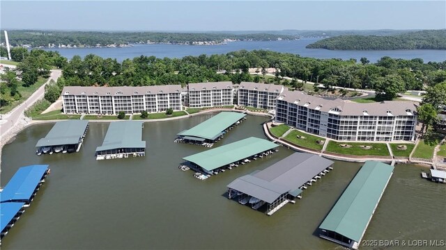 18130 Millstone Cove Rd Unit 447, Gravois Mills, MO 65037 - drone / aerial view of a nearby body of water and apartment complex / building