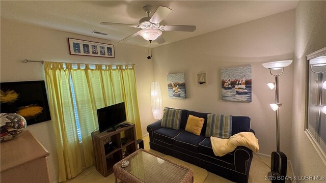18130 Millstone Cove Rd Unit 447, Gravois Mills, MO 65037 - carpeted living room featuring ceiling fan and baseboards