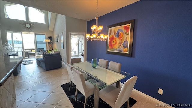18130 Millstone Cove Rd Unit 447, Gravois Mills, MO 65037 - dining area featuring a chandelier and light tile patterned flooring