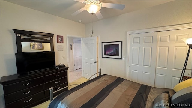 18130 Millstone Cove Rd Unit 447, Gravois Mills, MO 65037 - bedroom featuring a closet, ceiling fan, and light tile patterned floors