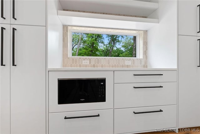 detailed view of black microwave