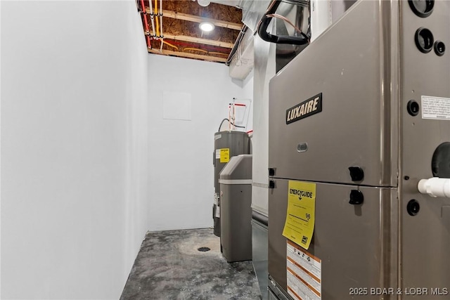 utility room with heating unit and electric water heater