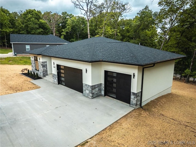 garage featuring driveway